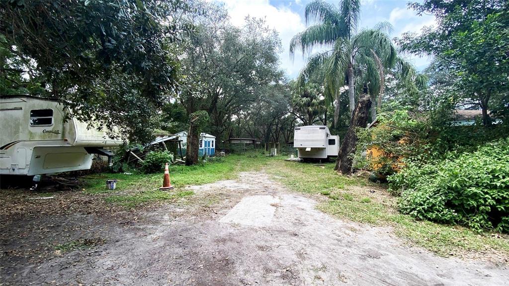 770 Snow Hill Road Geneva, FL 32732 - Photo 10 of 16 a car parked in front of a house