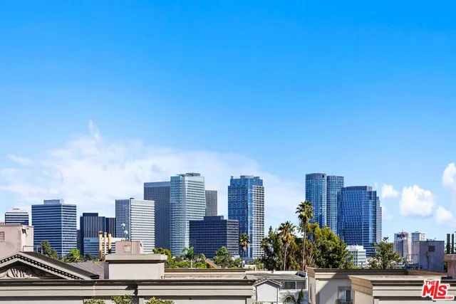 a view of a city with tall buildings