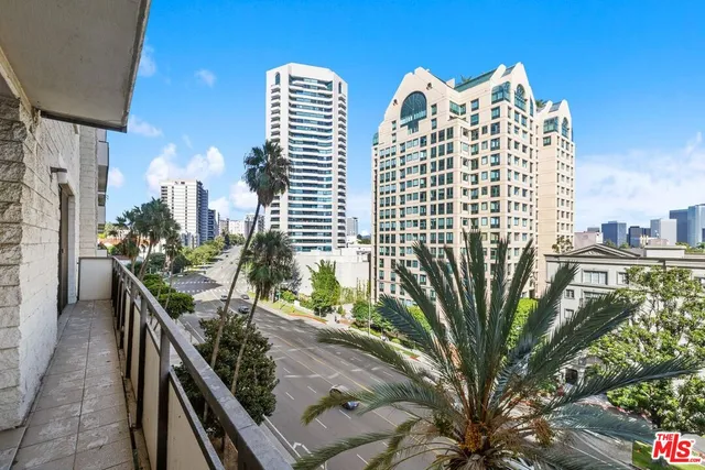 a view of a city with tall buildings