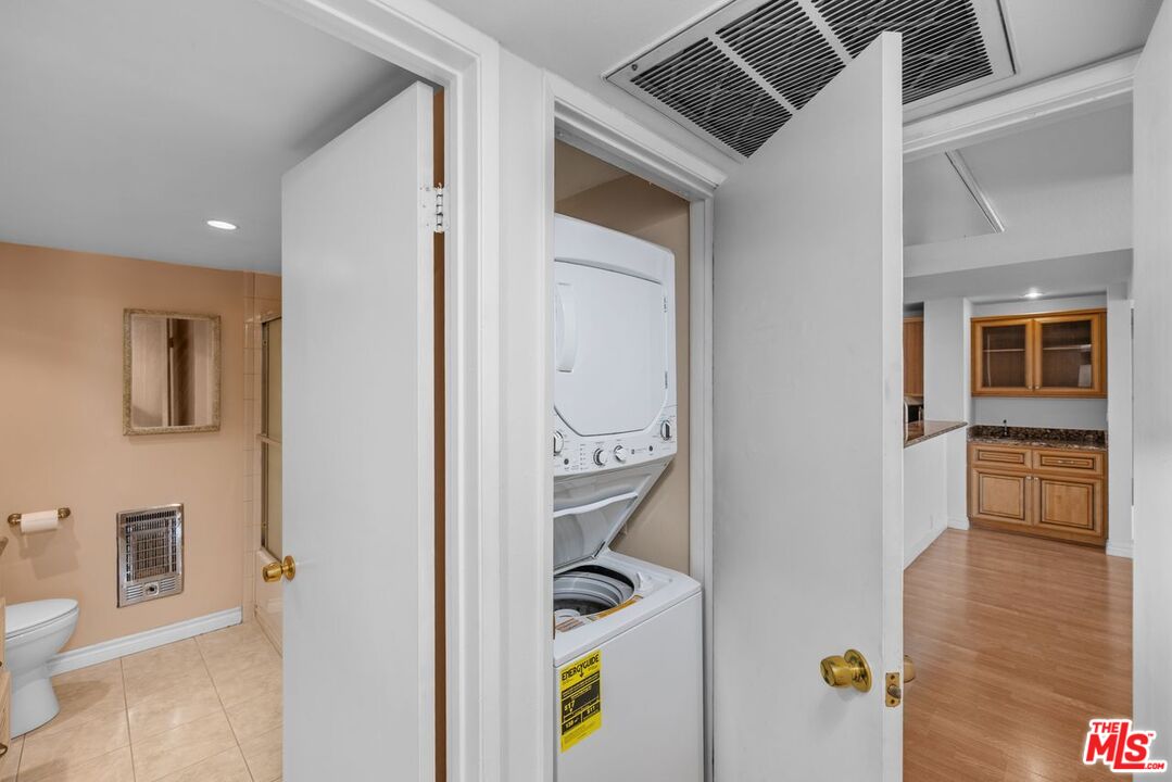10535 Wilshire Boulevard, Unit 801 Los Angeles, CA 90024 - Photo 14 of 53 a view of hallway with furniture and wooden floor