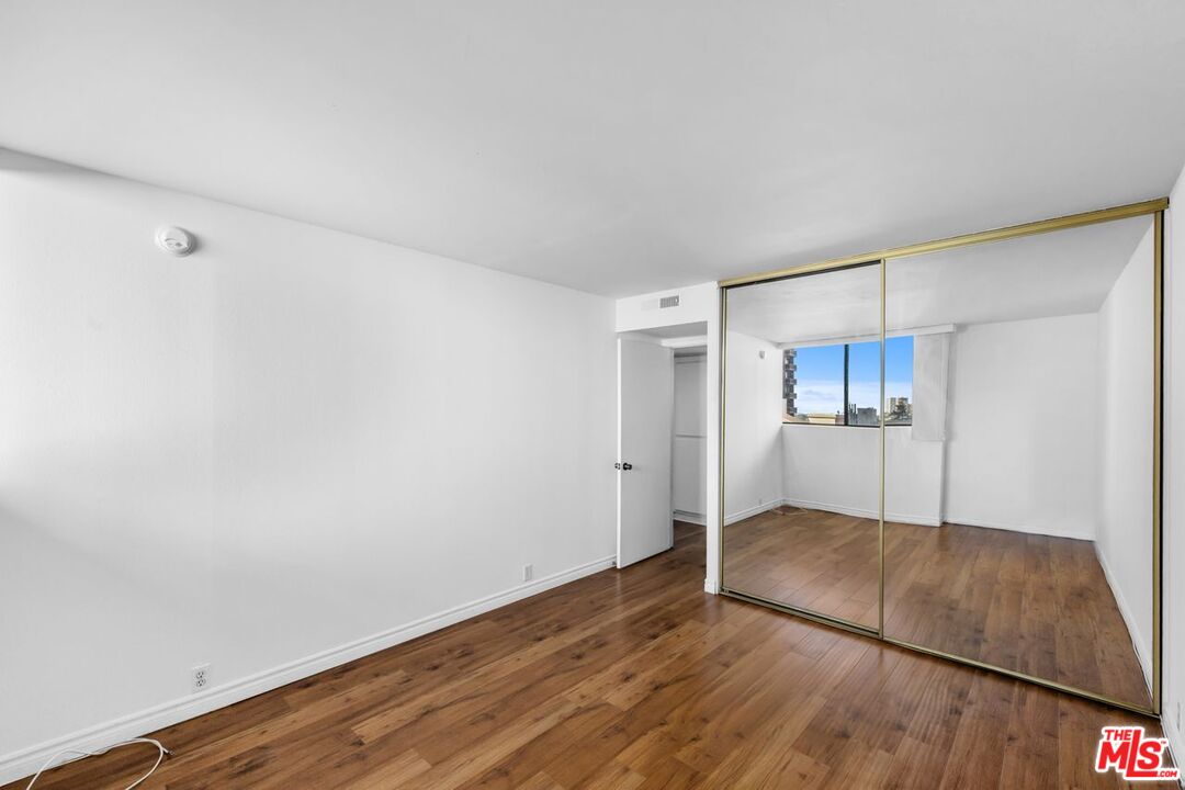 10535 Wilshire Boulevard, Unit 801 Los Angeles, CA 90024 - Photo 20 of 53 a view of a kitchen with wooden floor
