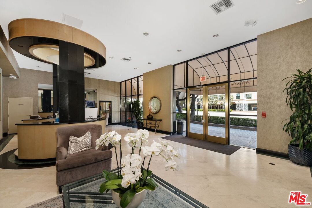 10535 Wilshire Boulevard, Unit 801 Los Angeles, CA 90024 - Photo 30 of 53 a living room with furniture
