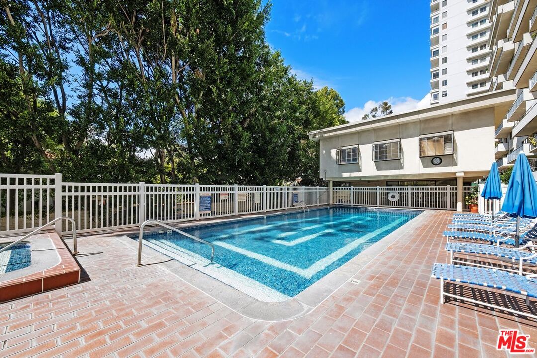 10535 Wilshire Boulevard, Unit 801 Los Angeles, CA 90024 - Photo 33 of 53 a view of a house with a backyard