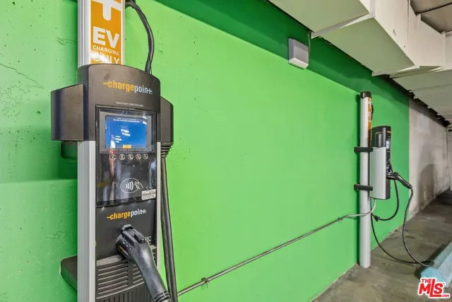 a view of a building with sitting area