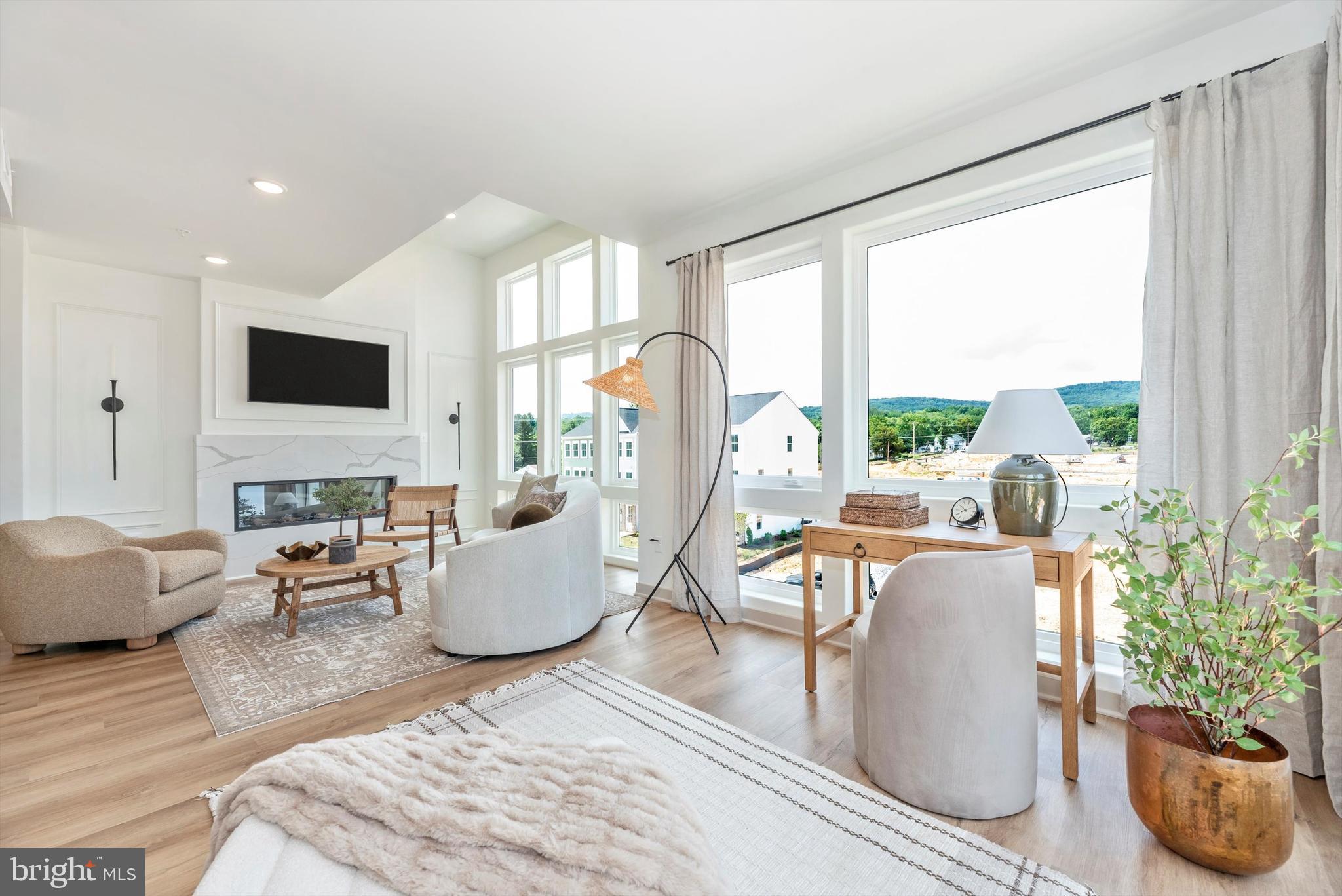 710 D Iron Frg Road Frederick, MD 21702 - Photo 1 of 37 a living room with furniture and a large window