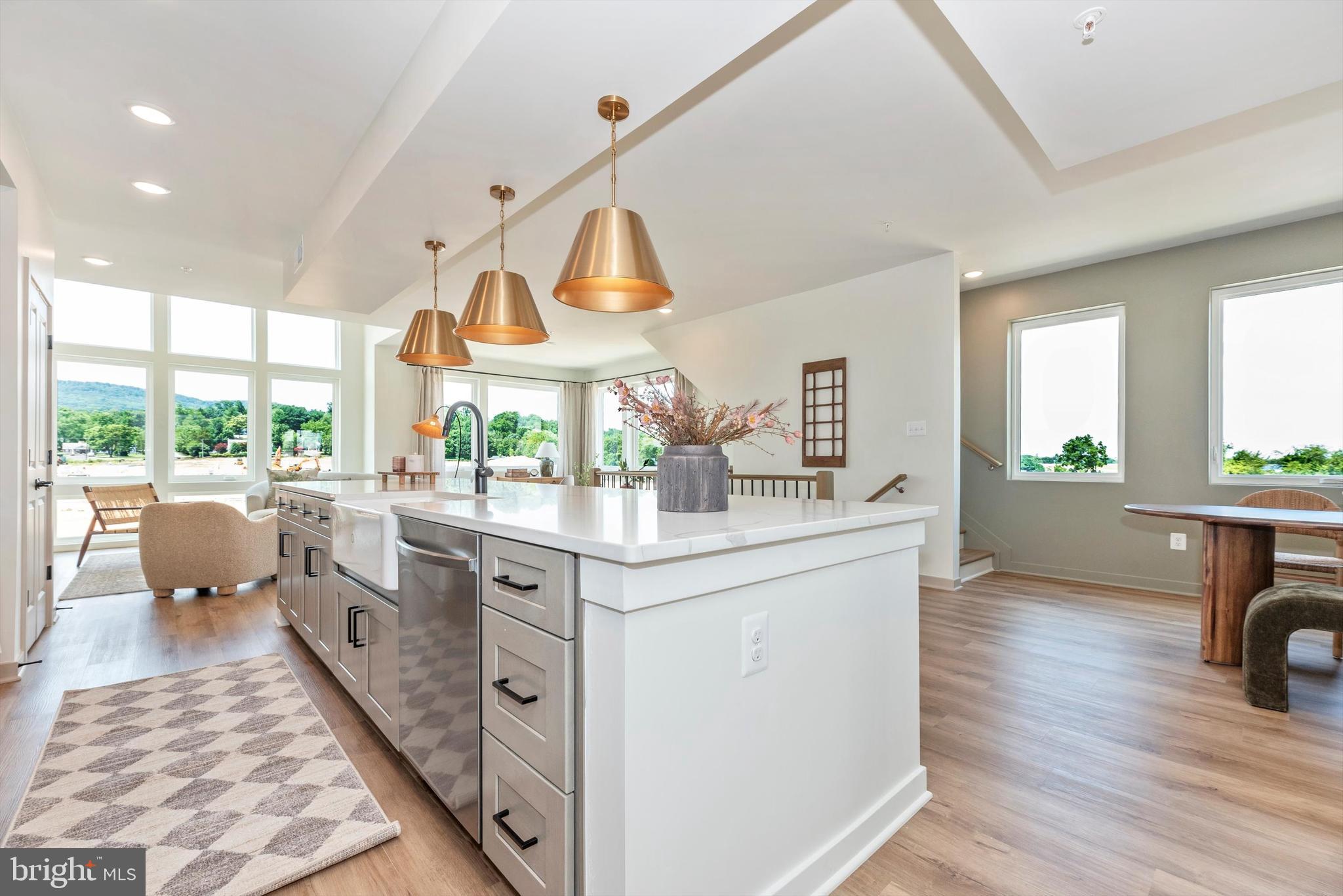 710 D Iron Frg Road Frederick, MD 21702 - Photo 19 of 37 a bathroom with a double vanity sink and a large mirror