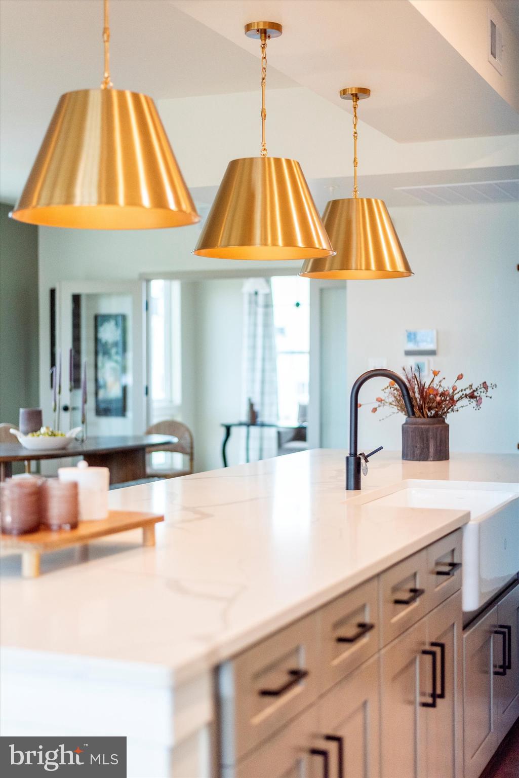 710 D Iron Frg Road Frederick, MD 21702 - Photo 20 of 37 a kitchen with a sink and a chandelier