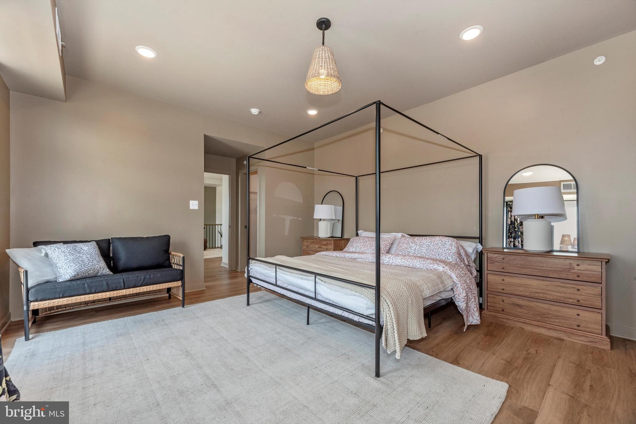 710 D Iron Frg Road Frederick, MD 21702 - Photo 26 of 37 a bedroom with a bed couch and window