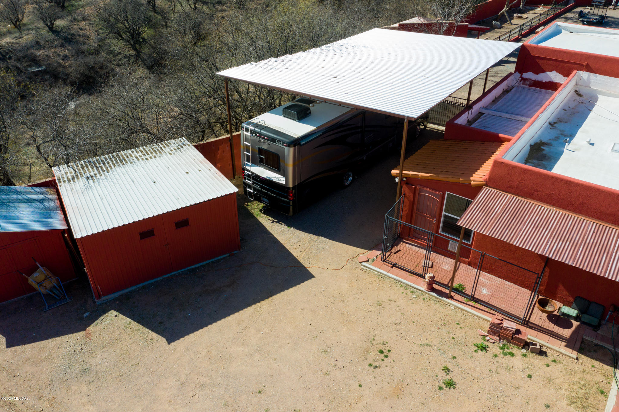 893 Gecko Lane Rio Rico, AZ 85648 - Photo 14 of 40 an aerial view of a house with a yard and sitting space