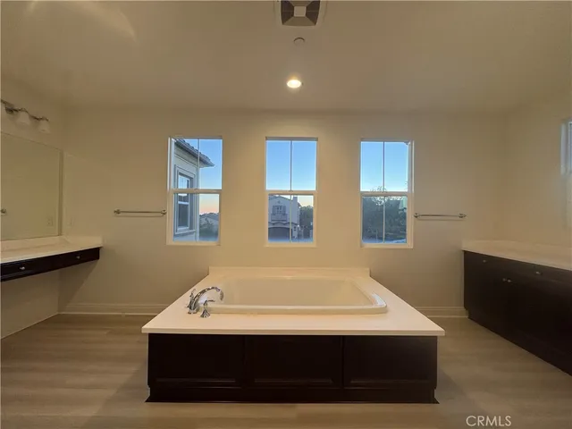 a bathroom with a sink and a bathtub