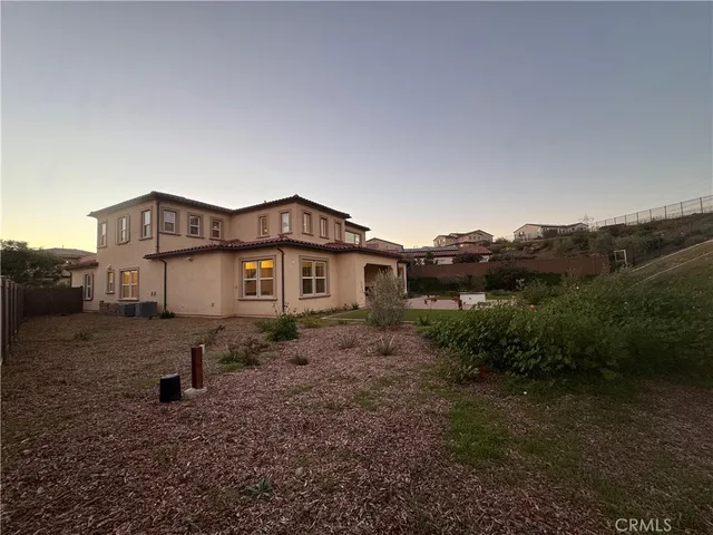 a house that has a lot of it and a yard