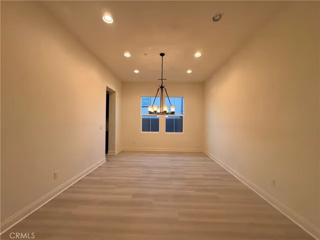 a view of a kitchen with a chandelier