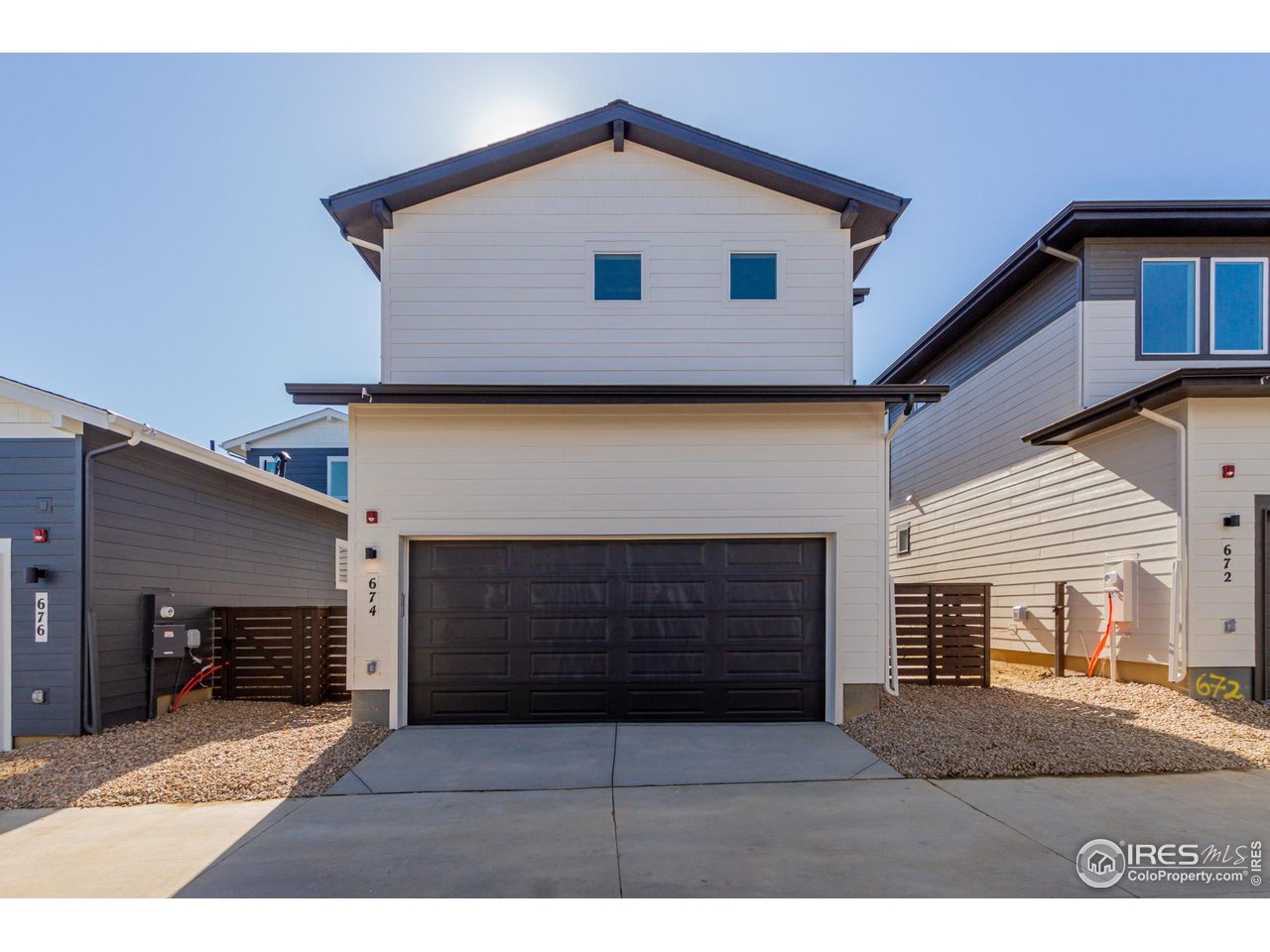 674 Apex Street Erie, CO 80516 - Photo 33 of 47 a house view with a outdoor space