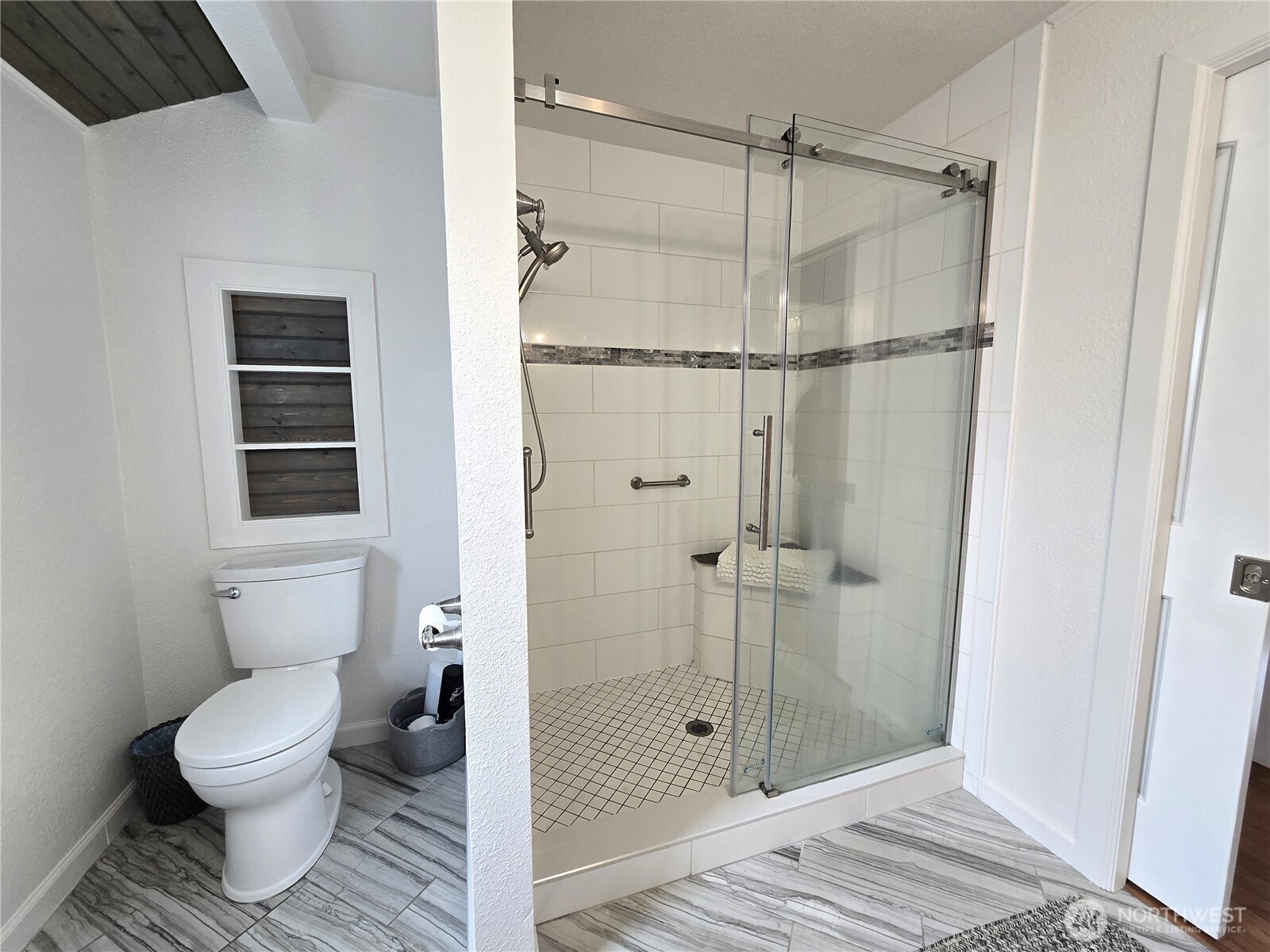 1102 West Anderson Street Elma, WA 98541 - Photo 16 of 40 a bathroom with a toilet and a shower