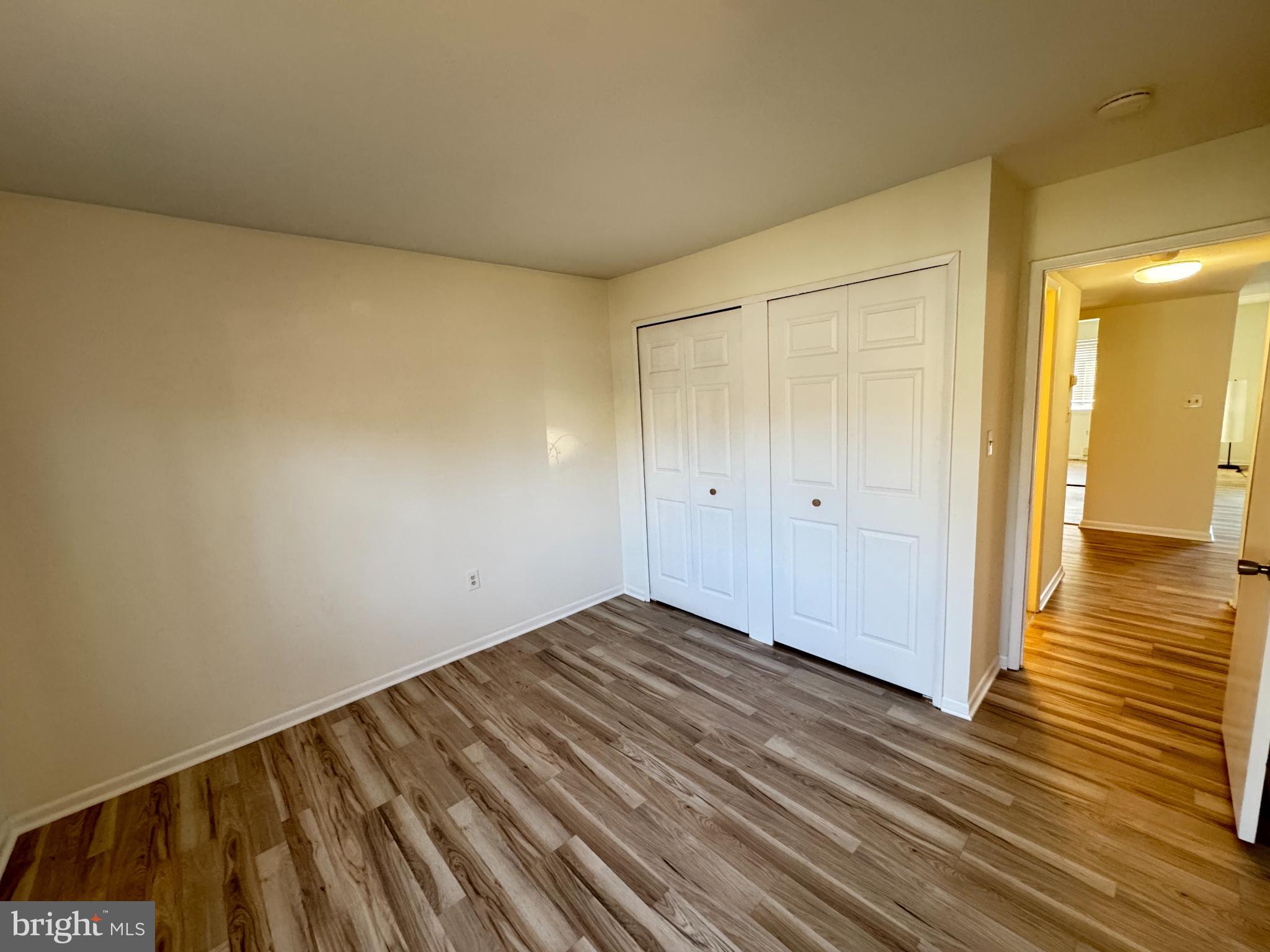 5033 Green Mountain Circle, Unit 2 Columbia, MD 21044 - Photo 24 of 40 a view of a room with wooden floor