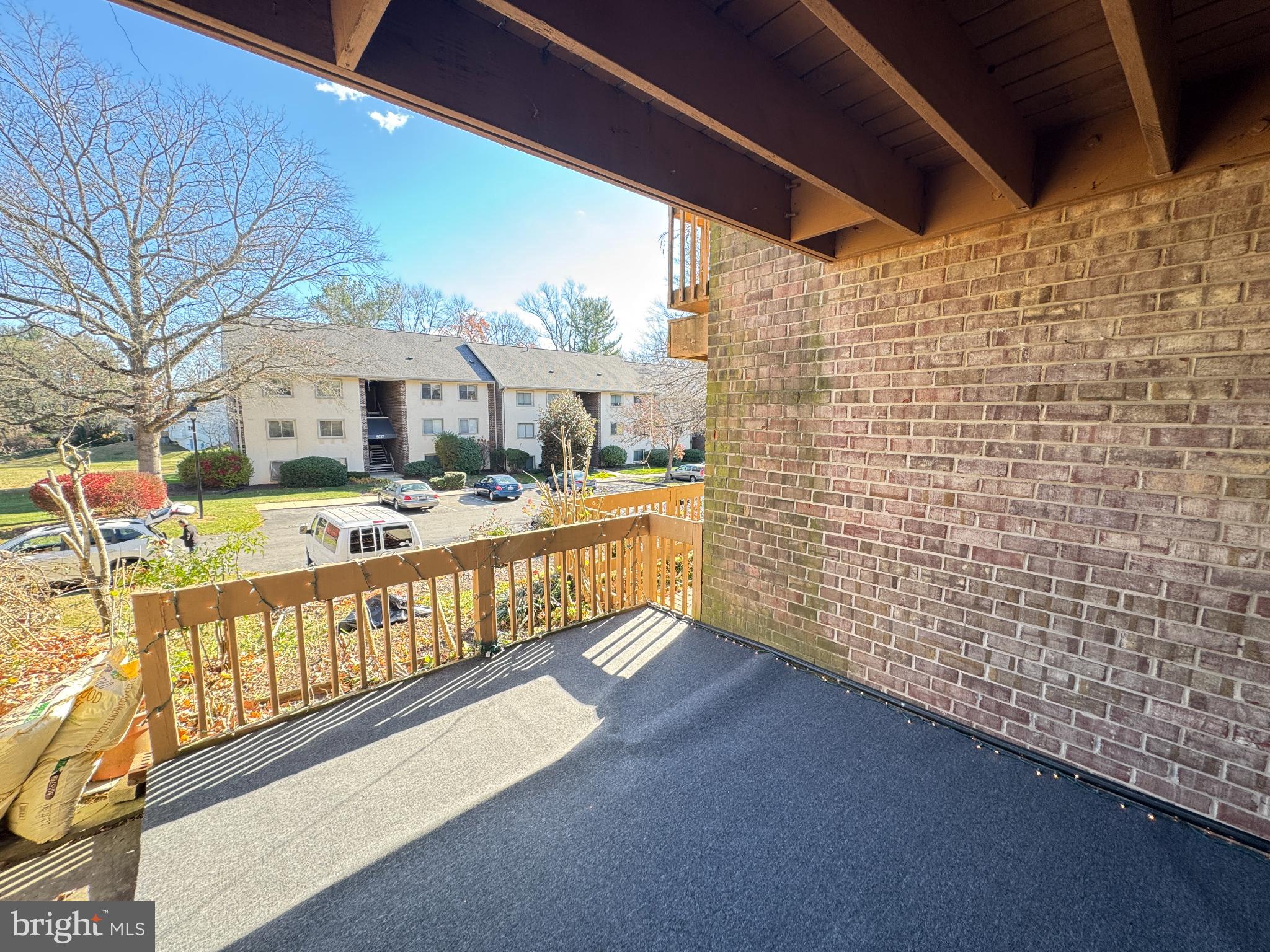 5033 Green Mountain Circle, Unit 2 Columbia, MD 21044 - Photo 27 of 40 Sunny balcony with a view of greenery.