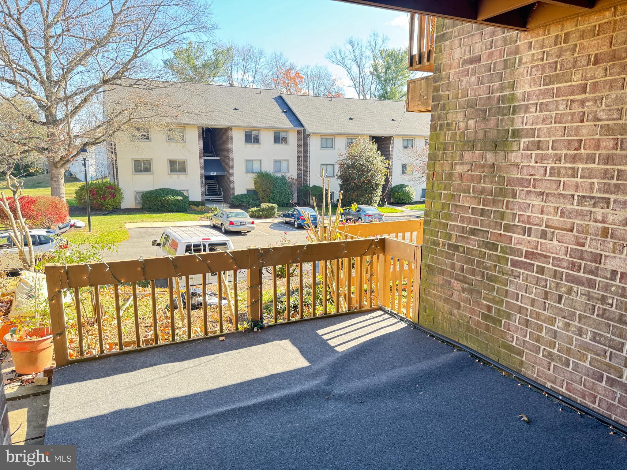 5033 Green Mountain Circle, Unit 2 Columbia, MD 21044 - Photo 36 of 40 Sunny balcony with a view of greenery.