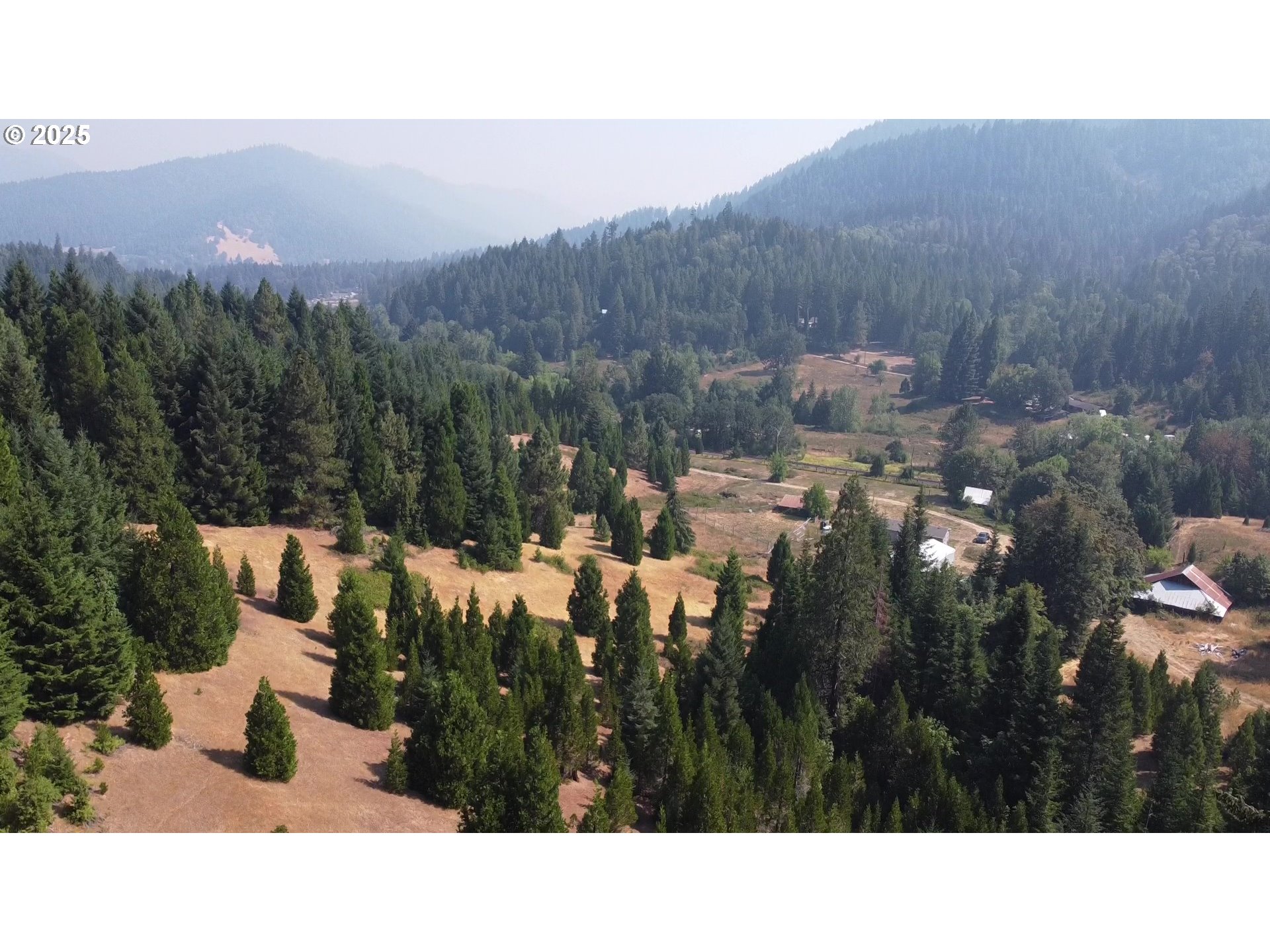 911 Tunnel Road Glendale, OR 97442 - Photo 29 of 29 a black and white photo of a house