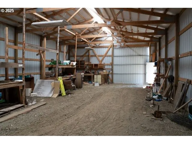 a view of a small house with a small yard