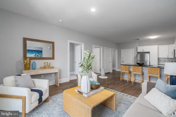 a living room with furniture and a table