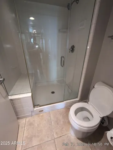 a view of an empty room with stairs