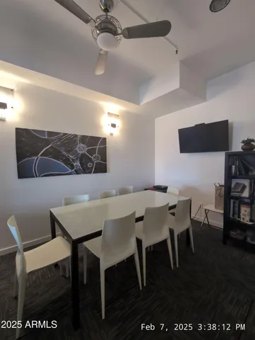 a view of a dining room with furniture