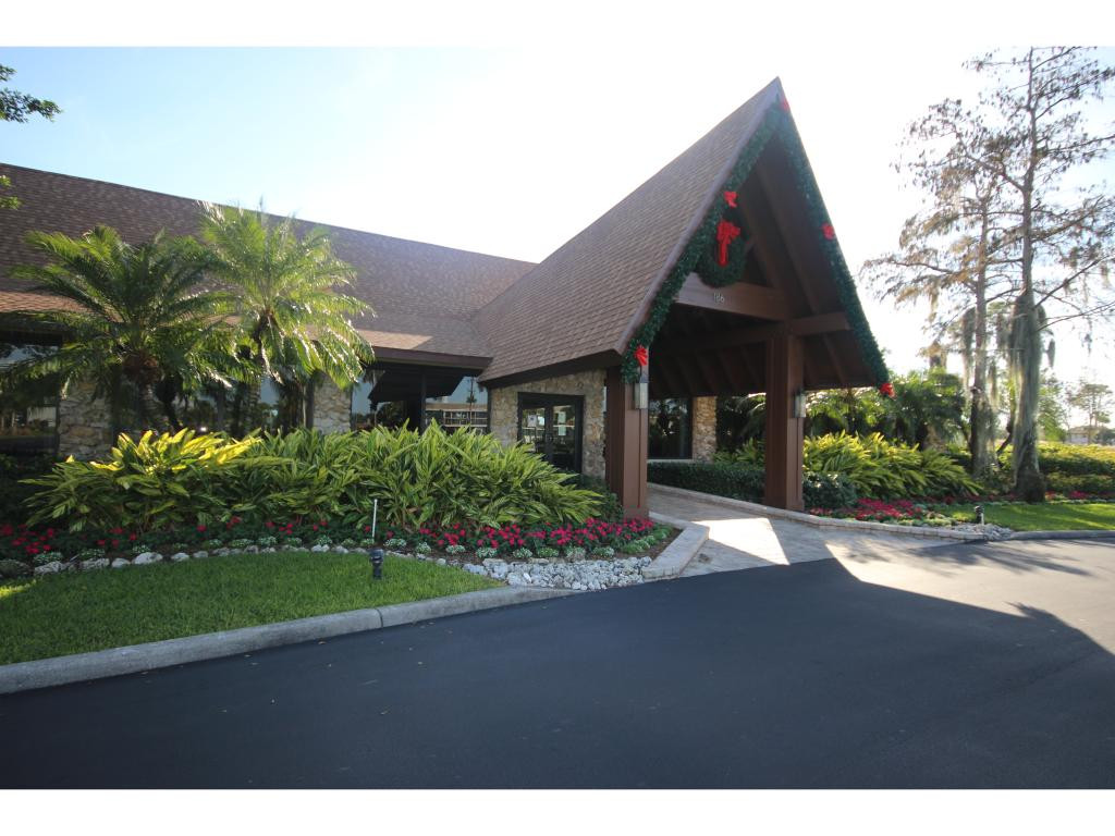 700 Teryl Road, Unit 1 Naples, FL 34112 - Photo 23 of 33 a view of a house and a yard