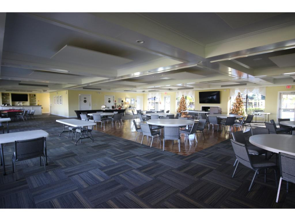 700 Teryl Road, Unit 1 Naples, FL 34112 - Photo 24 of 33 a living room with lots of furniture and view of kitchen