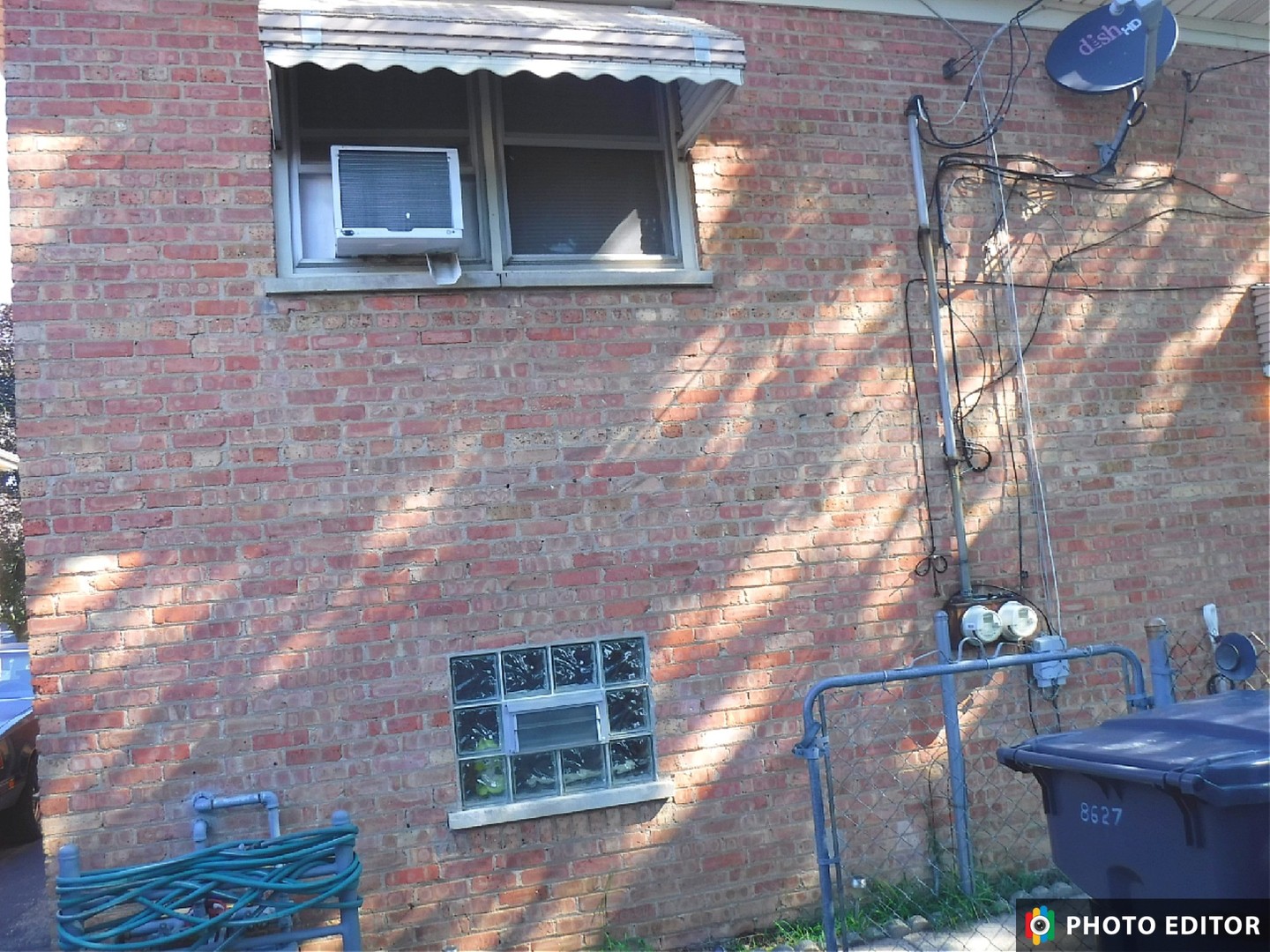 8627 44th Street Lyons, IL 60534 - Photo 4 of 6 a front view of a house with outdoor space