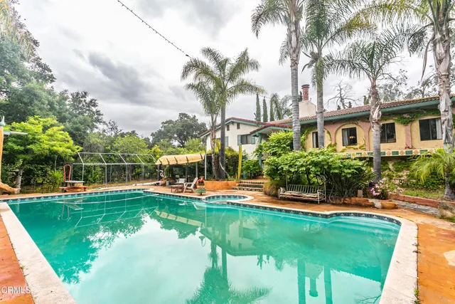 a view of a house with backyard porch and patio