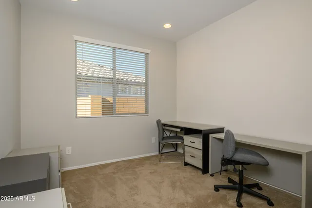 a view of a house with dining space and wooden floor
