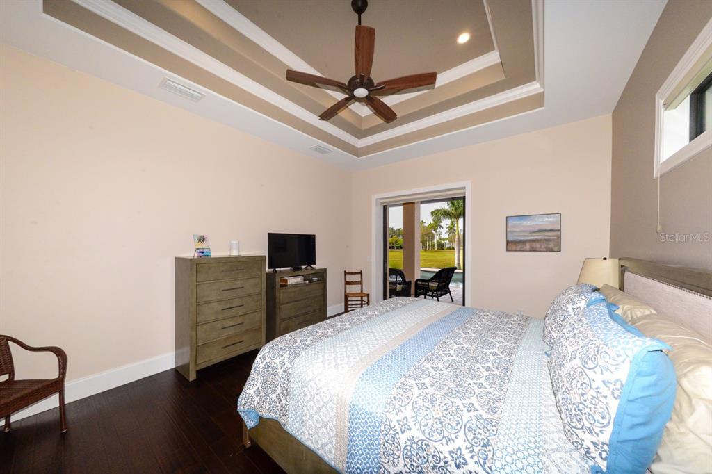 185 Colony Point Drive Punta Gorda, FL 33950 - Photo 22 of 54 a bedroom with bed and window