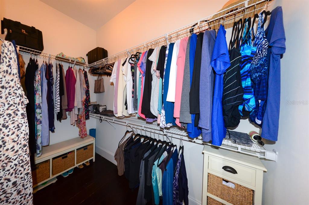 185 Colony Point Drive Punta Gorda, FL 33950 - Photo 25 of 54 a view of walk in closet with clothes