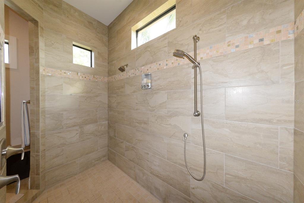 185 Colony Point Drive Punta Gorda, FL 33950 - Photo 31 of 54 a bathroom with a shower