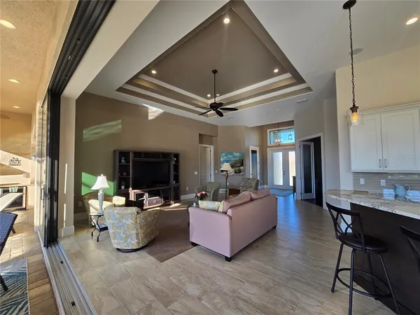 a view of a dining room with furniture window and outside view