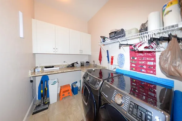 an aerial view of a house with a ocean view