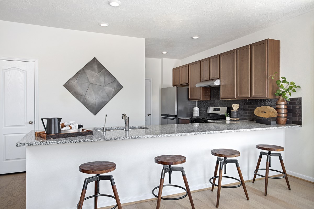 25610 White Vortex Drive Spring, TX 77373 - Photo 6 of 12 This spacious kitchen has it all—ample storage, generous counter space, and a layout that truly makes it the heart of the home.