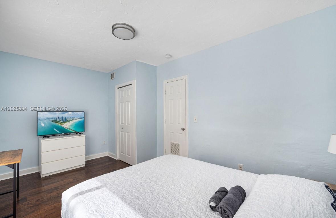 2255 Southwest 10th Street, Unit B Miami, FL 33135 - Photo 22 of 26 a bedroom with a bed and a window