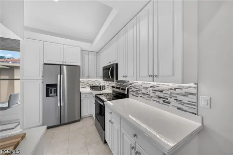 $1,050,000 | 1855 Les Chateaux Boulevard, Unit 5201, Naples, FL 34109