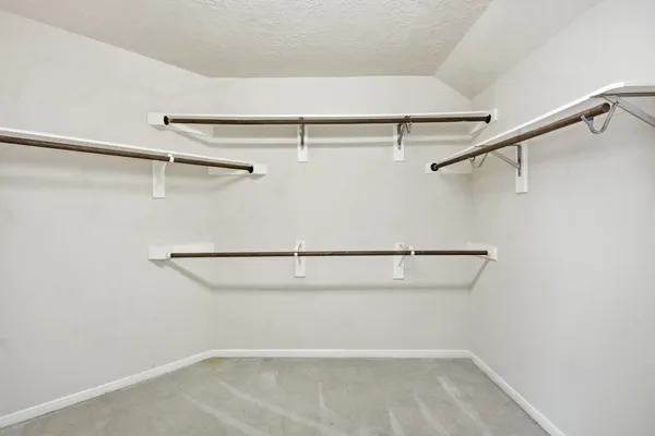 a view of a room with racks on the wall