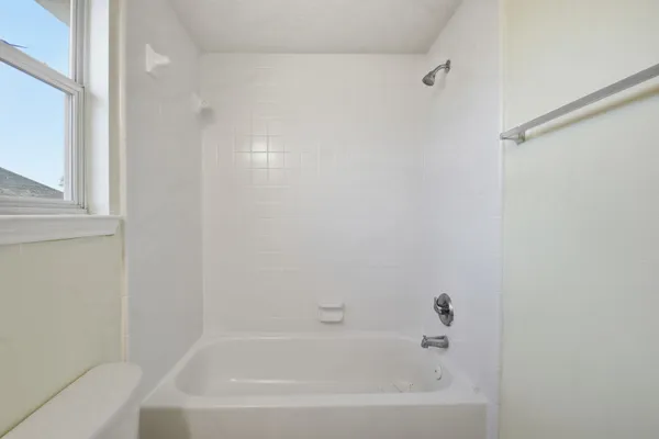 a bathroom with a bathtub