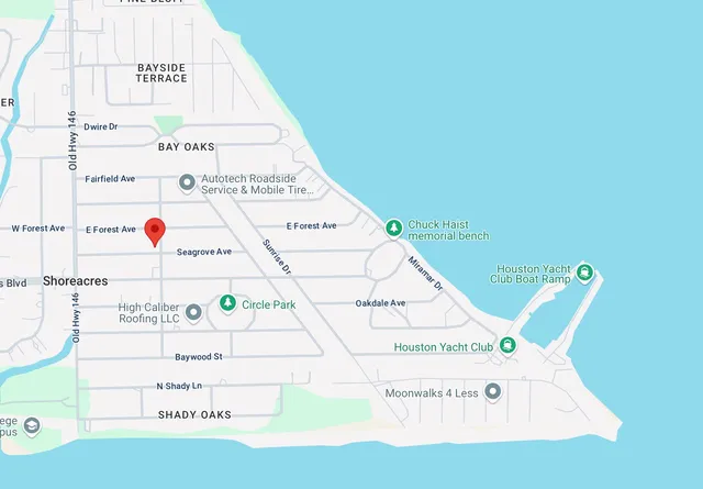 a picture of a book and a white bed