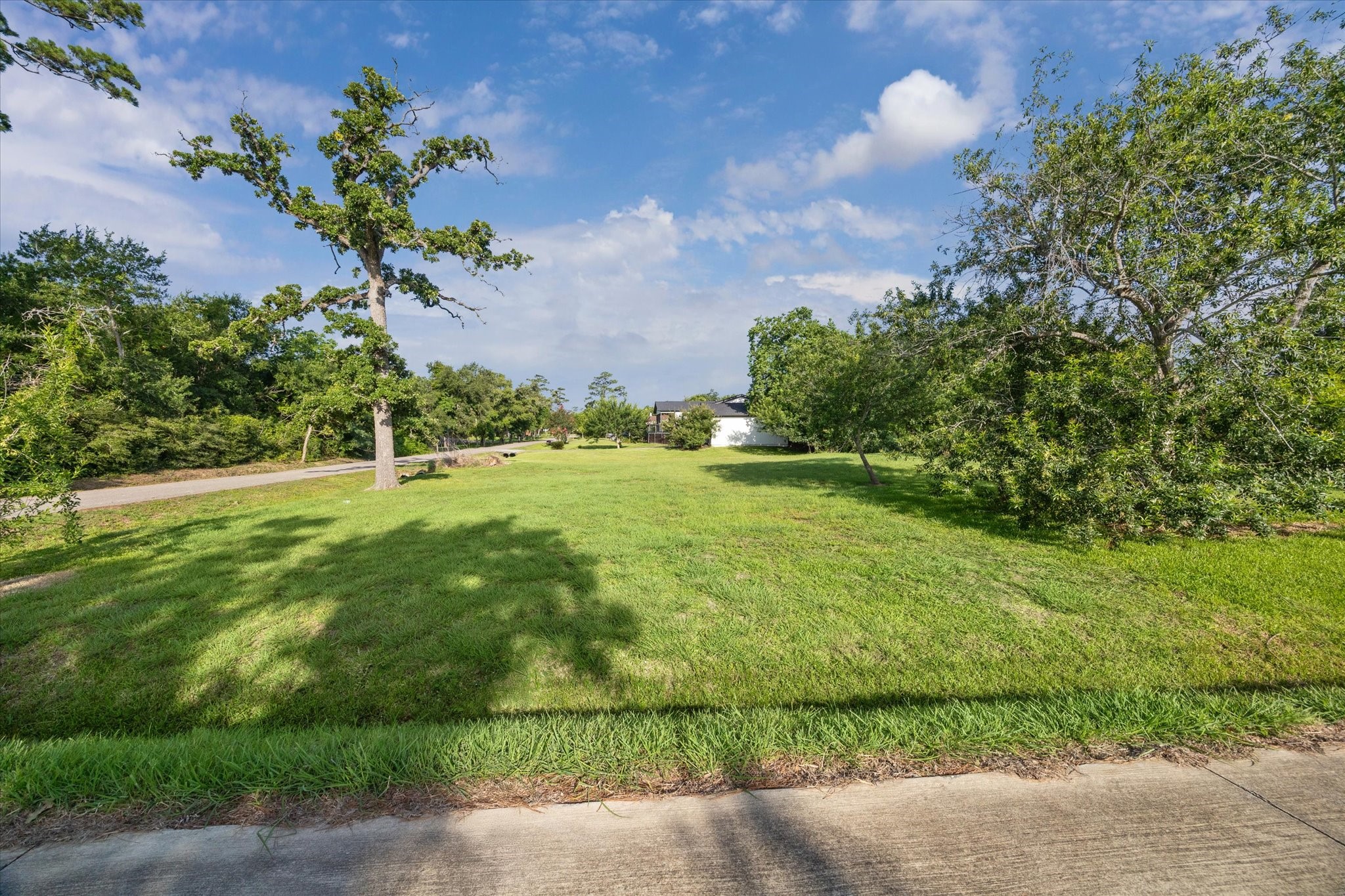 3410 Byway Avenue Shoreacres, TX 77571 - Photo 5 of 12 a view of a golf course with a flower garden