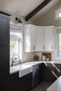 a kitchen with a sink and cabinets