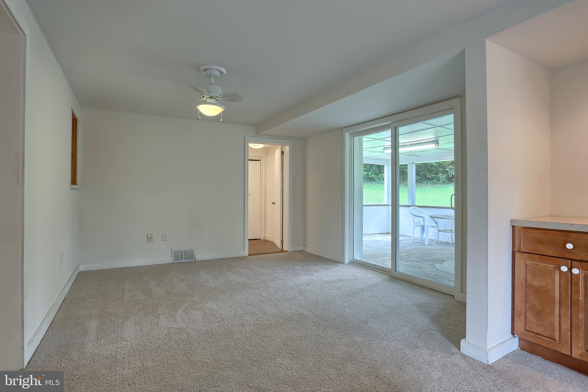 431 Luther Road Harrisburg, PA 17111 - Photo 13 of 40 Sliders to covered rear patio. New Carpet!