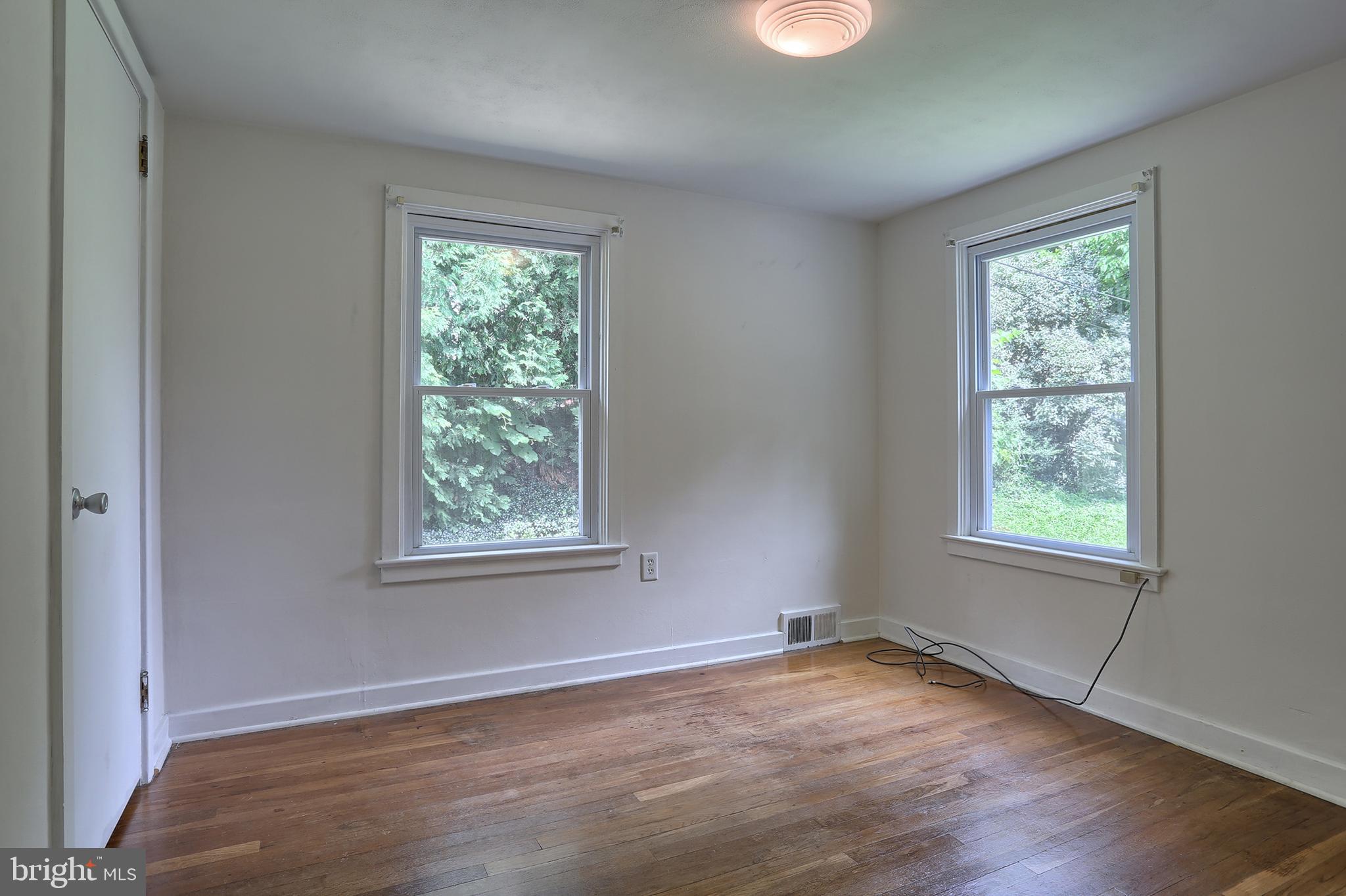 431 Luther Road Harrisburg, PA 17111 - Photo 20 of 40 Bedroom #2 . Hardwood. Replacement windows.