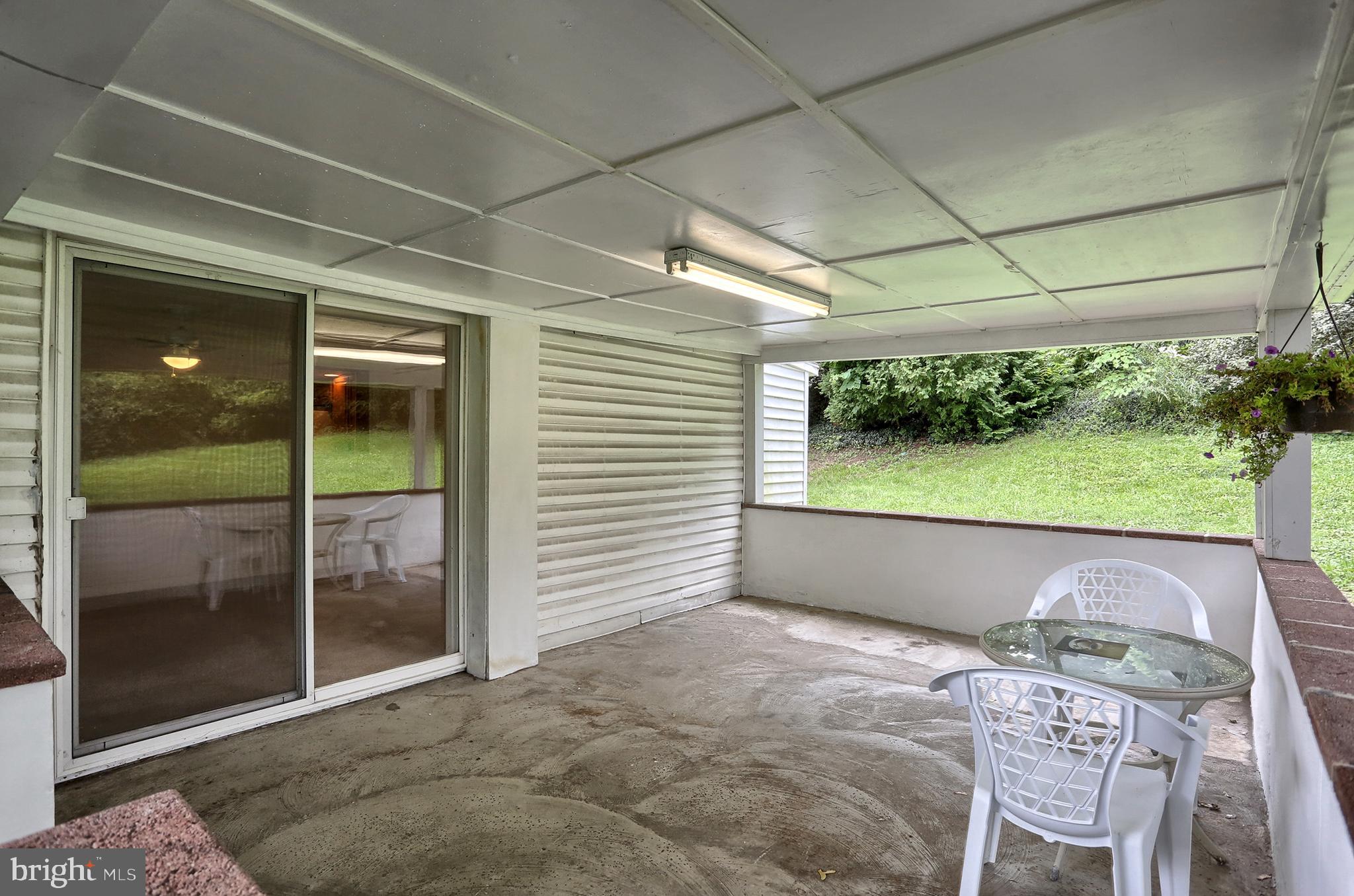 431 Luther Road Harrisburg, PA 17111 - Photo 30 of 40 Covered Rear Patio access from Dining Room.