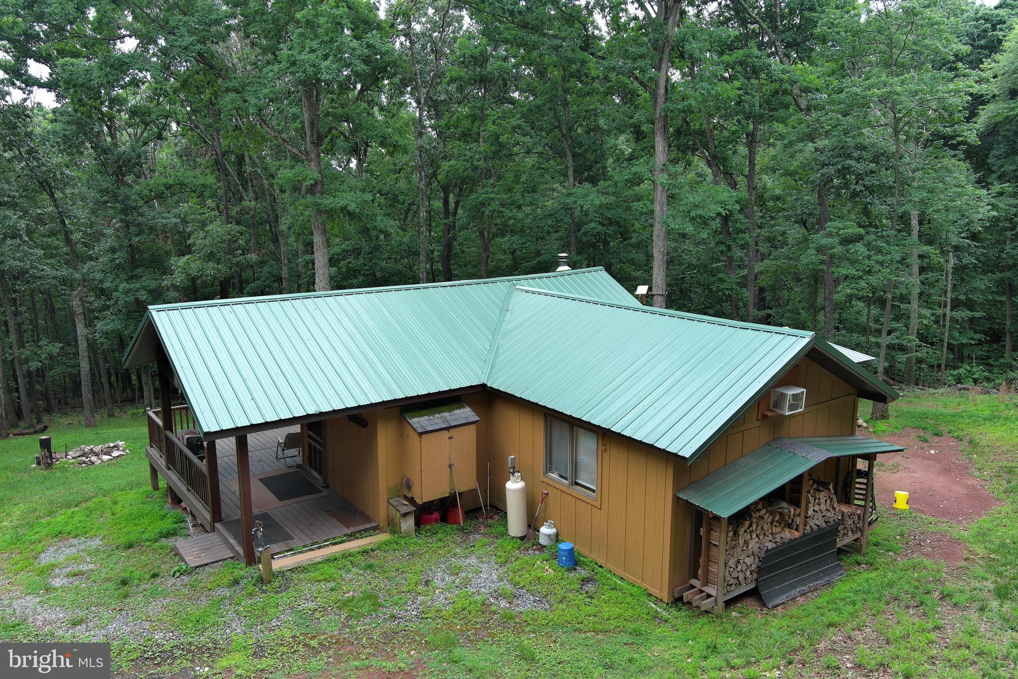 1419 Paul's Woods Road Delray, WV 26714 - Photo 79 of 105 an aerial view of a house with roof deck and backyard