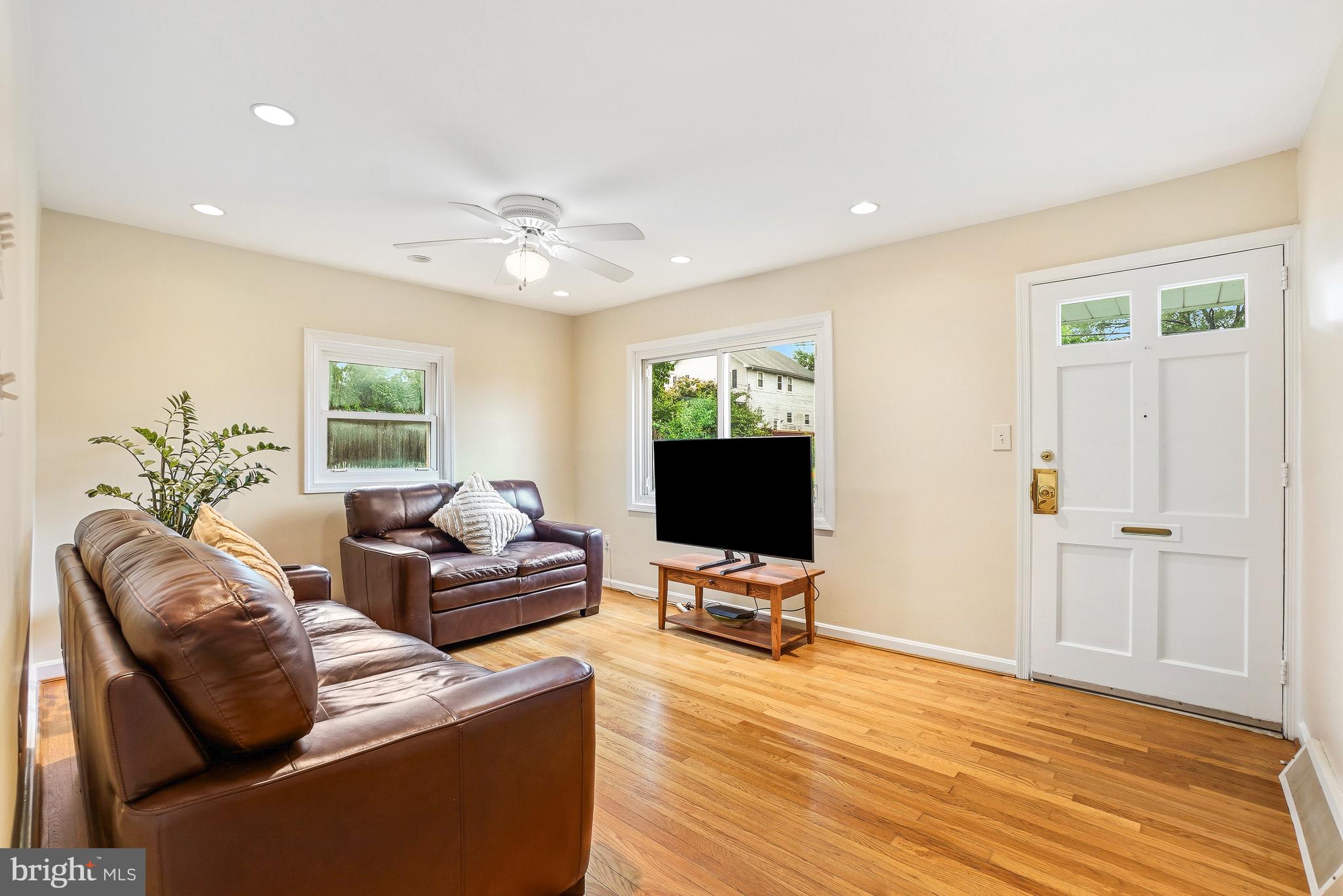 12311 Middle Road Silver Spring, MD 20906 - Photo 3 of 33 Entry into Family Room with Hardwood Flooring