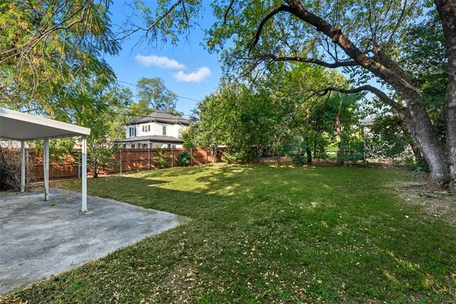 a view of backyard with green space